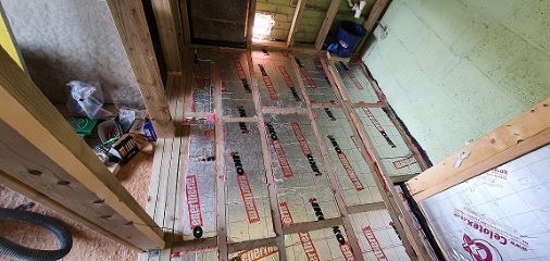 Floor Insulation Fitting By The Home Insulation Company