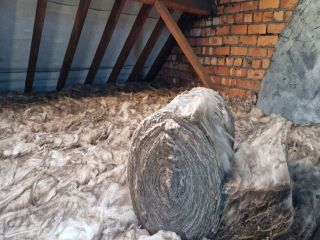 Loft Insulation Roll Fitting